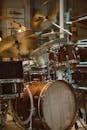 Detailed view of a sparkling drum set in a music store with cymbals, showcasing musical instruments.